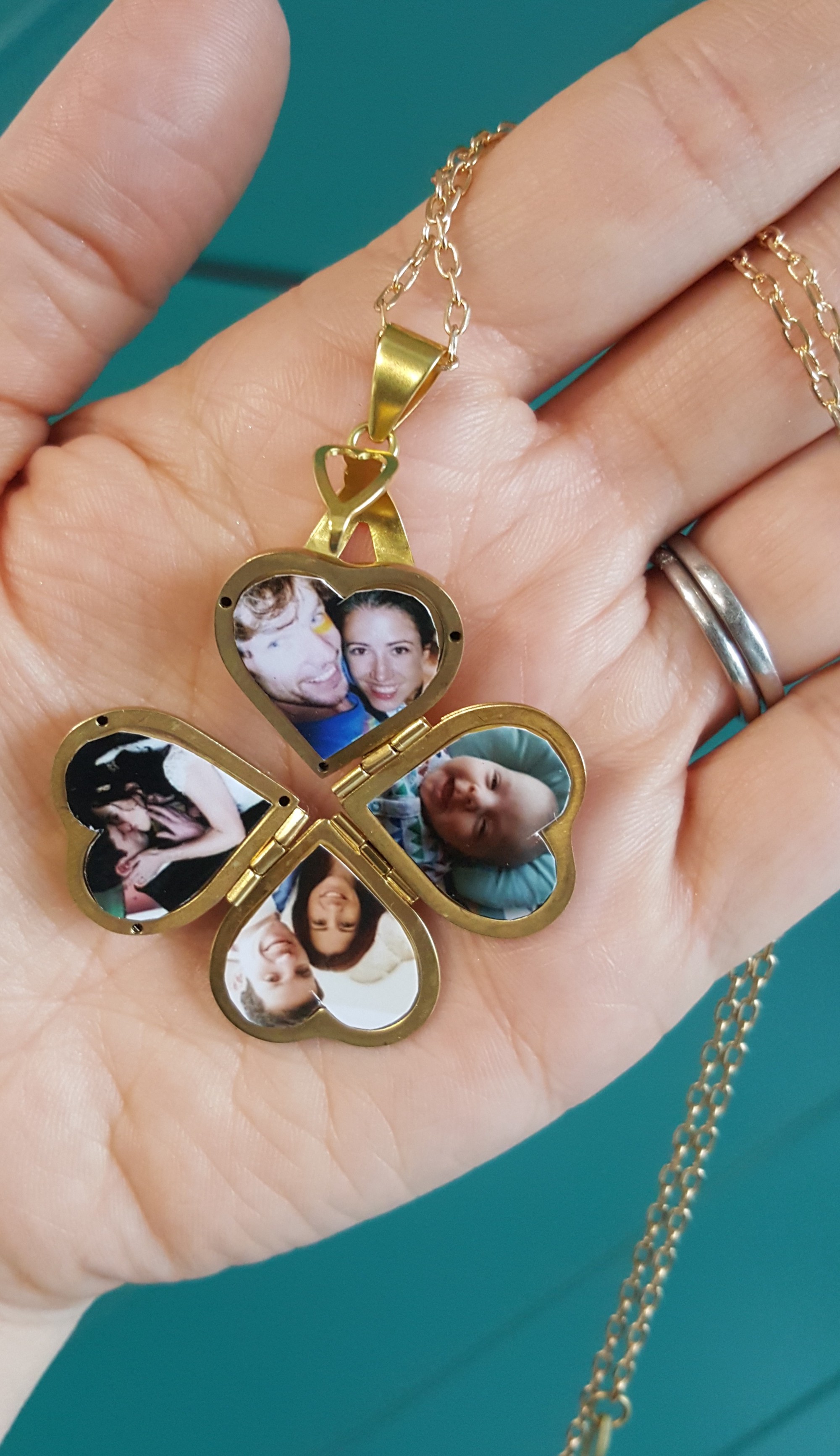 Heart shape photo locket with four pictures each side with gold chain