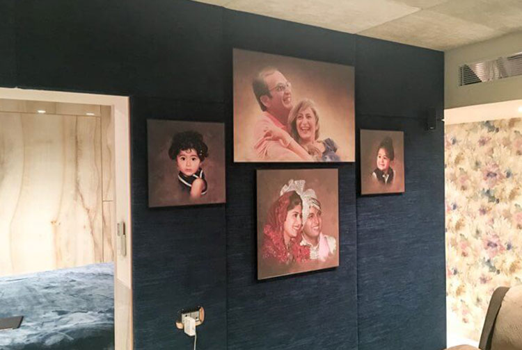 Blue photo wall having four photo frames